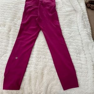Lululemon Invigorate high rise 25” tight fuschia size 4